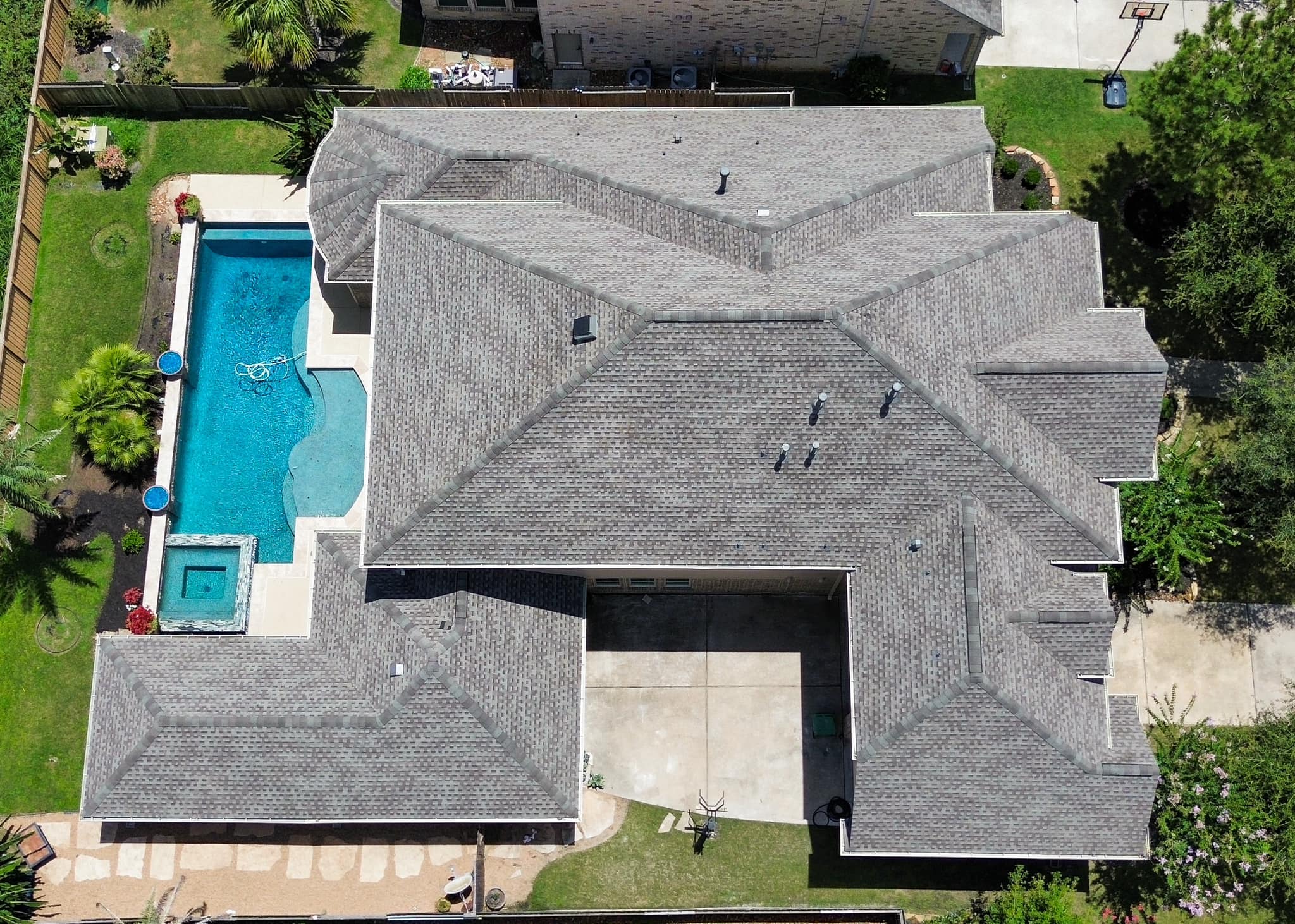 side of a house with an impact resistant roof side of a house with an impact resistant roof